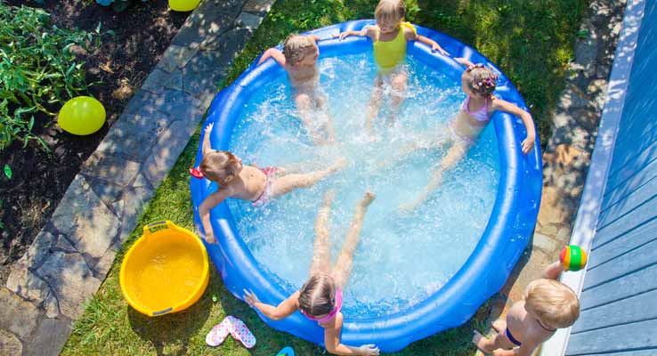https://www.shutterstock.com/image-photo/little-boy-inflatable-swimming-pool-outdoor-464059643